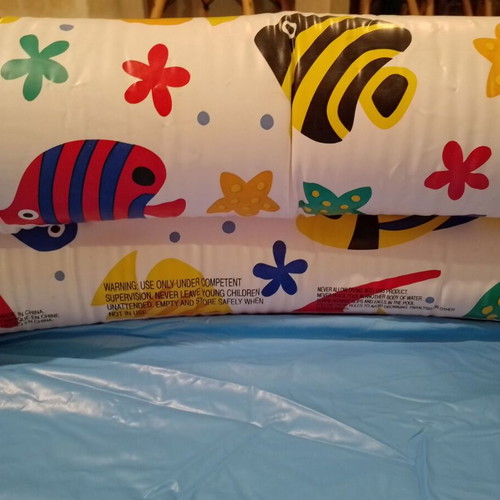 Inflatable children's pool with fish design used