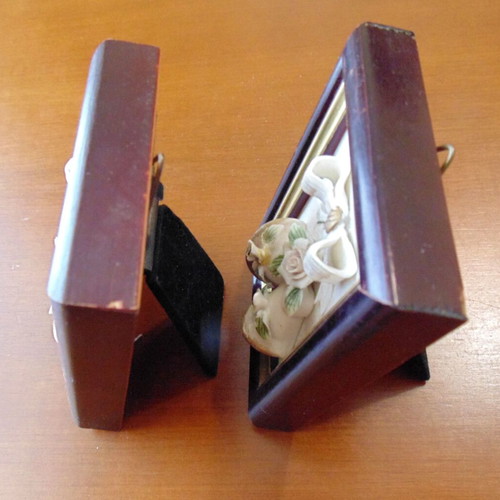 Pair of small frames used with handmade embossed porcelain bells and flowers