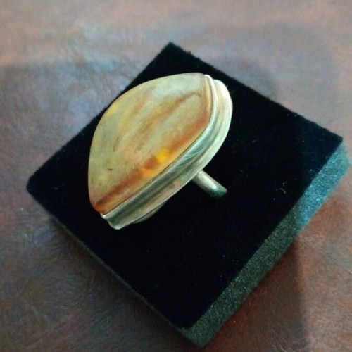 Silver women's ring with amber used