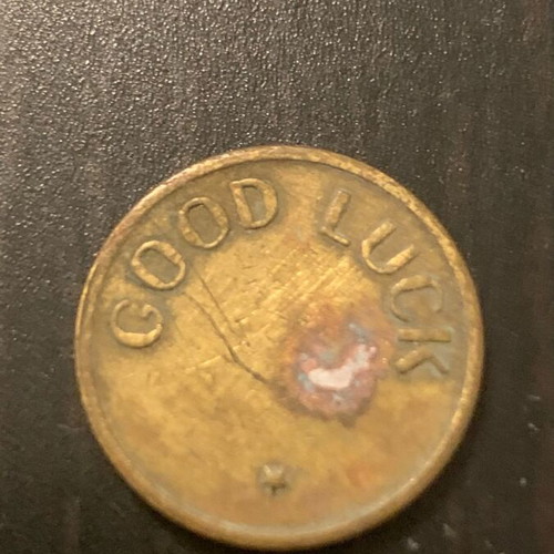 Good Luck coin used, as seen