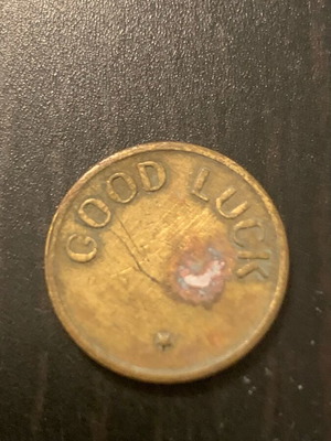 Good Luck coin used, as seen