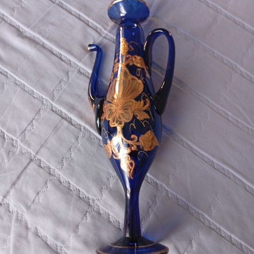 Vintage cobalt blue decorative vase with gold floral motifs