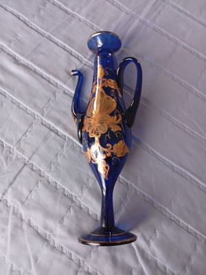 Vintage cobalt blue decorative vase with gold floral motifs