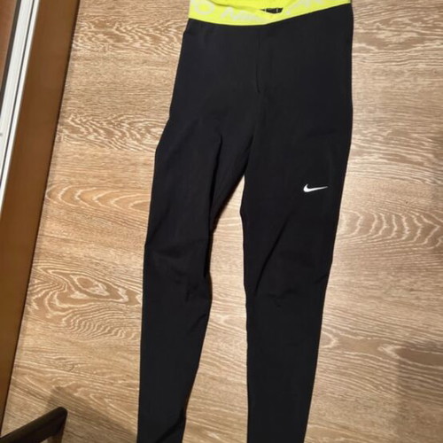 Nike leggings black with yellow waistband, size XS