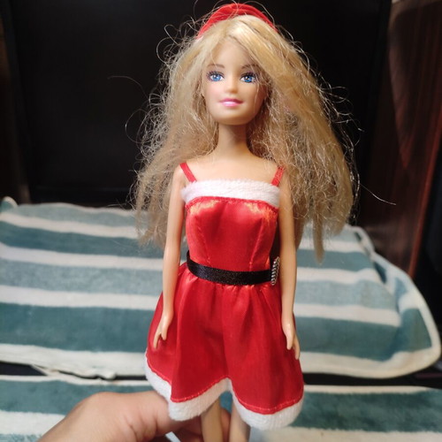 Doll dressed as Santa Claus used