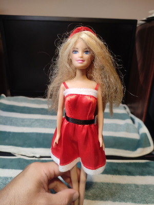 Doll dressed as Santa Claus used