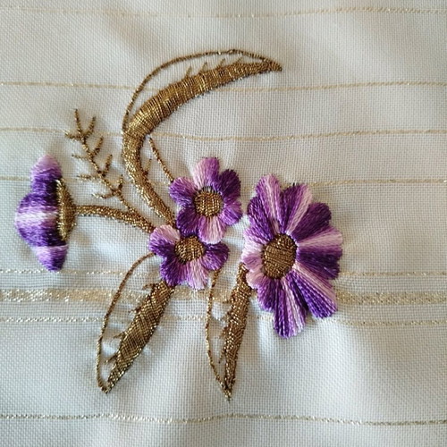 Embroideries used, two small doilies with gold thread and lace