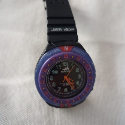 Adidas watch like new with original day and month indicator