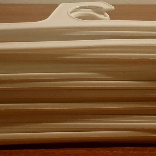 Small white hangers like new, pack of 15 pieces