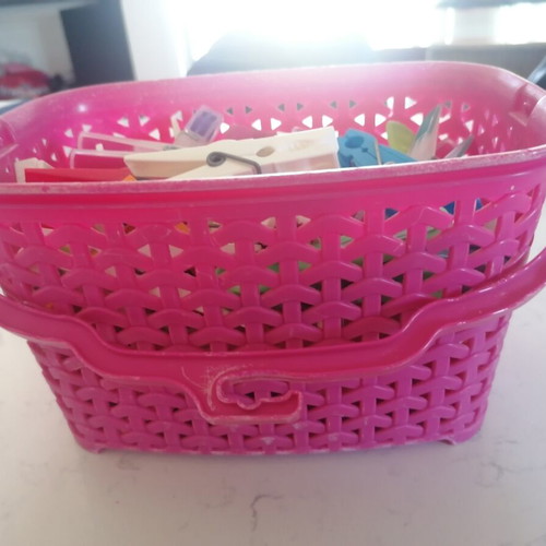 Basket with clothespins like new