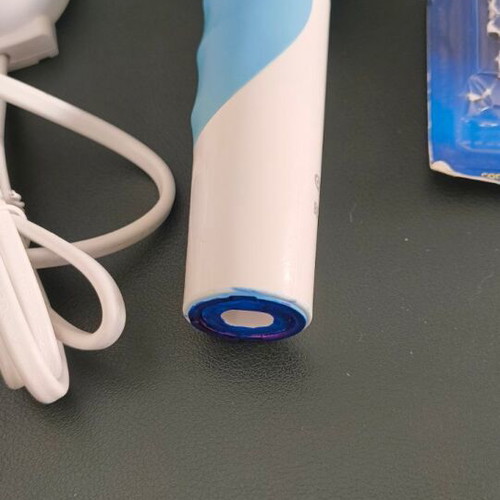 Oral-B Vitality electric rechargeable toothbrush with charger and replacement head