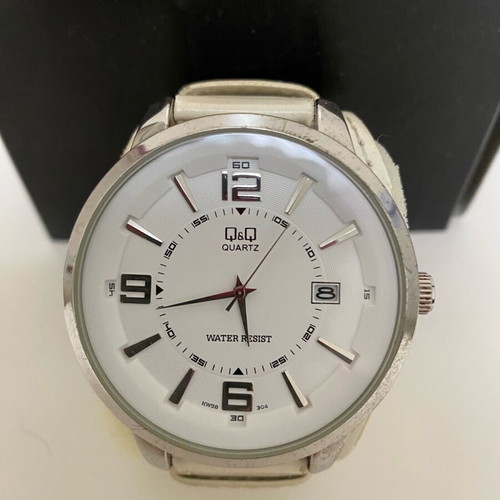 Quartz watch used, beige, needs strap replacement