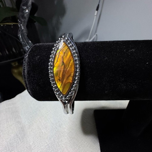 Adjustable bracelet like new, orange and silver