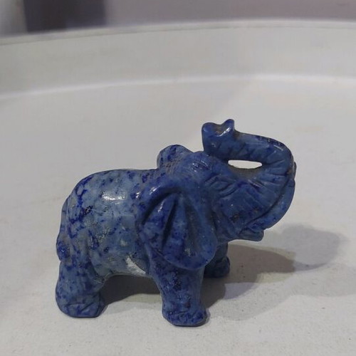 Decorative elephant carved from natural blue stone like new