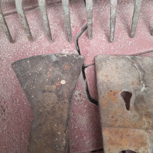 Old tools used, axe and rake