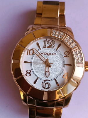 Vogue women's watch like new, gold steel