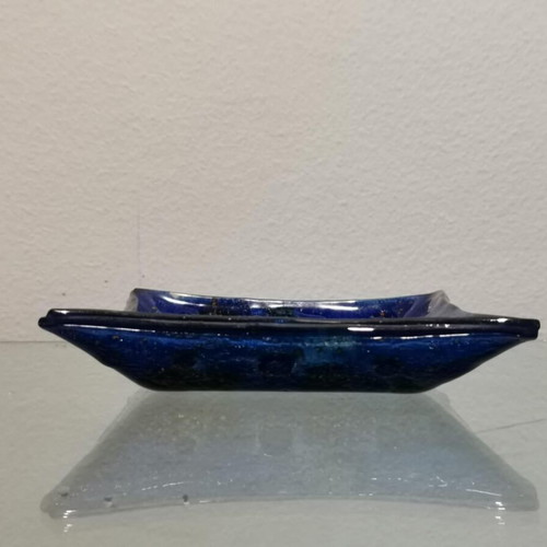 Decorative plate used, blown glass blue with green and yellow elements