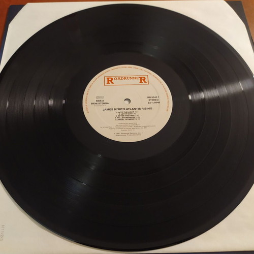 James Byrd's Atlantis Rising LP like new, metal