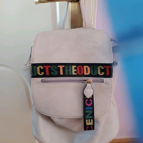 Backpack like new, light gray color
