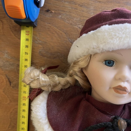 Porcelain doll with hat and braids, 40 cm