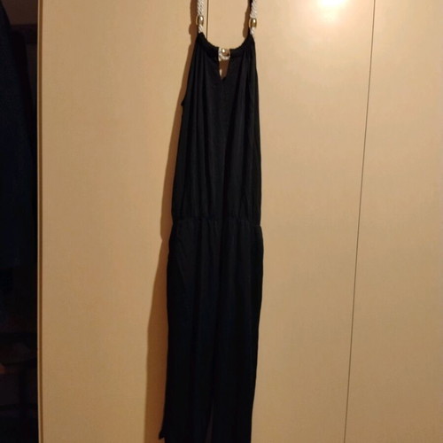 Black one-piece jumpsuit backless like new, size M
