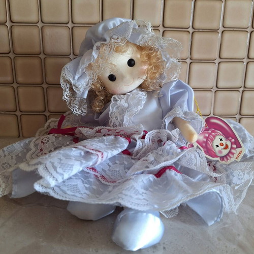 Collectible doll with music and movement from 1980s, new