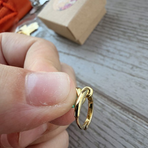 Gold-plated silver hoop earrings with green stone
