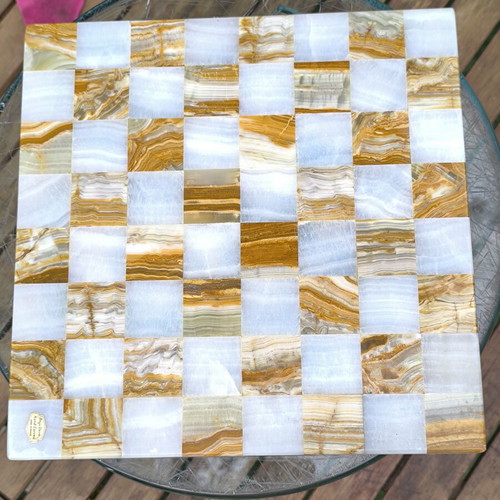 Handmade marble chessboard in brown and white shades