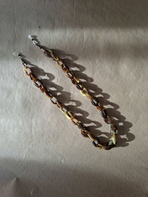 Sunglasses chain like new, brown tortoise imitation with leather end