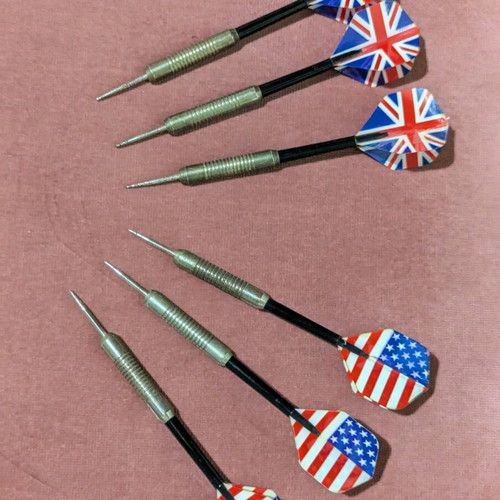 Dartboard with darts used, double-sided