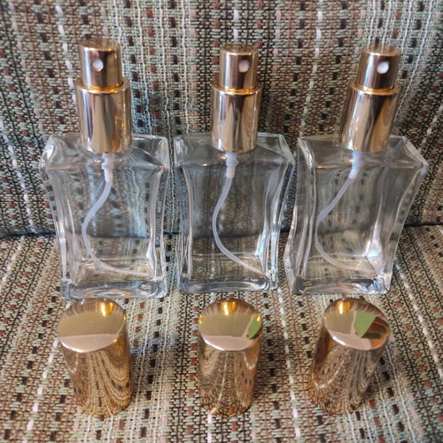Glass bottles set of 3 used with sprayers and caps