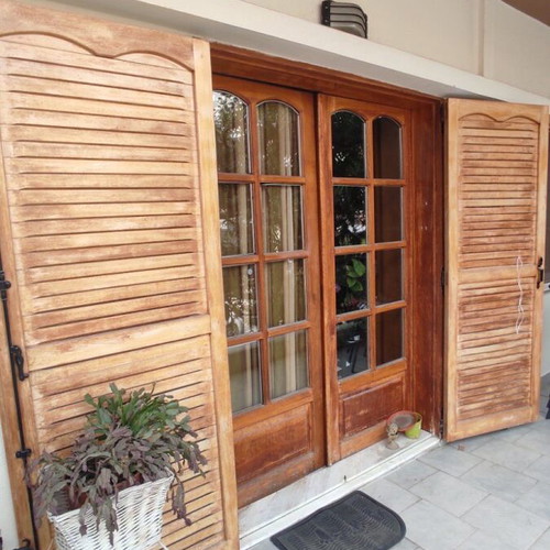 Wooden window frames used, solid mahogany with double glass