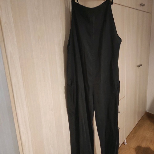 One-piece jumpsuit used, black with side pockets