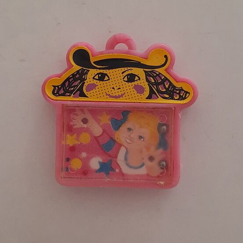 Vintage '80s games keychains with marbles like new