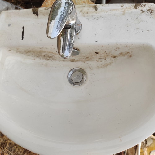 Sink with faucet and valve used