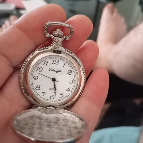 Dhalya pocket watch like new with intricate designs and new battery