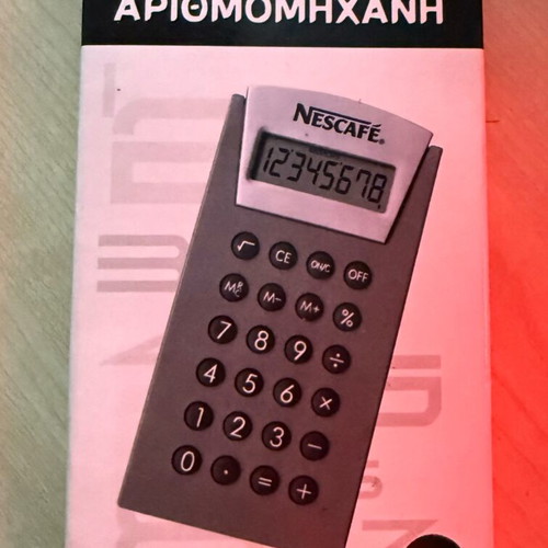 Nescafé calculator like new, collectible 1990 computer