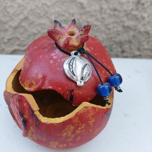 Red vintage pomegranate with storage used