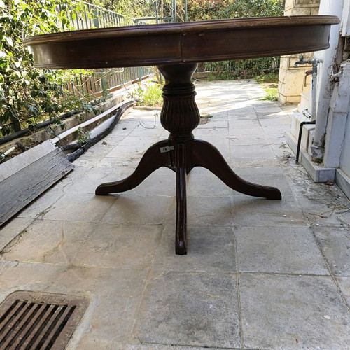 Solid round table with extension mechanism like new