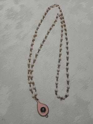 Necklace with evil eye charm used