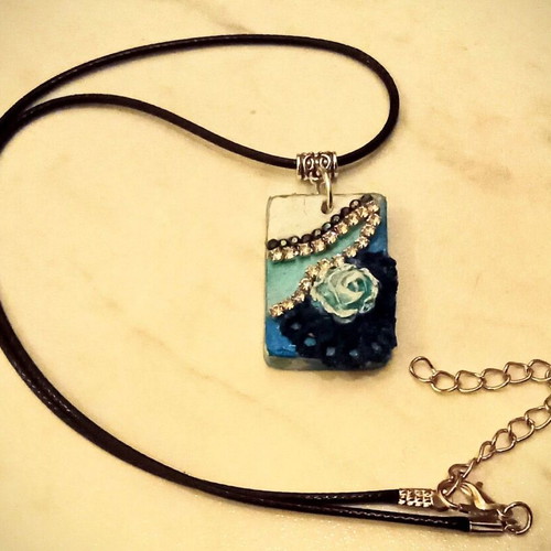 Handmade necklace new with blue and white details
