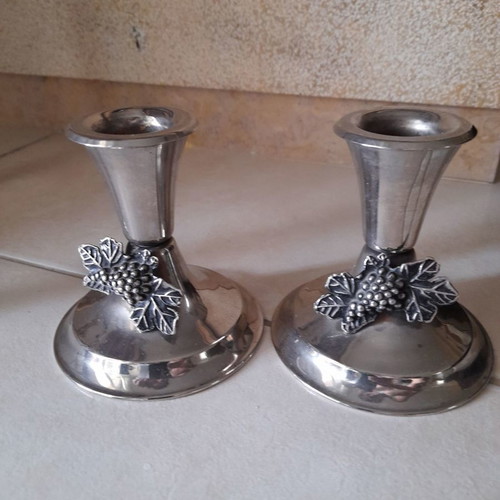 Silver candlestick set used with grape decoration