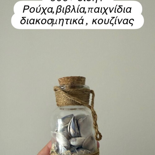 Mini jar with seashells like new