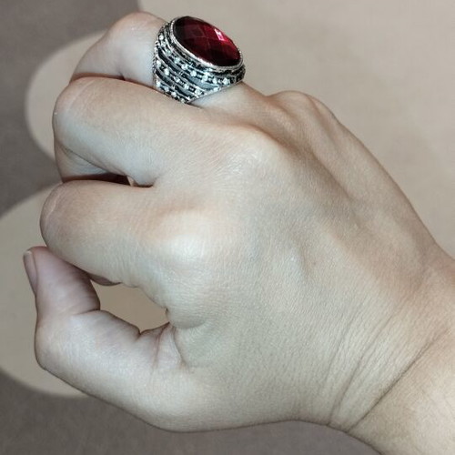 Statement cocktail ring with large red stone and rhinestones