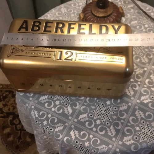 Metal Bottle Case like new with collectible bottle