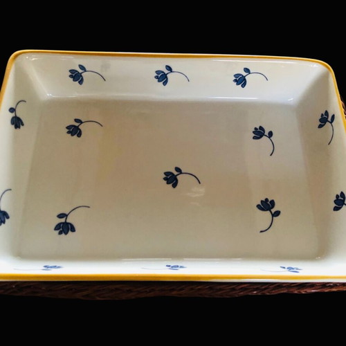 Rectangular Pyrex used with blue flowers and wicker base