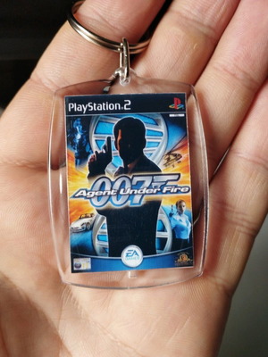 007 Agent Under Fire PS2 keychain, transparent acrylic