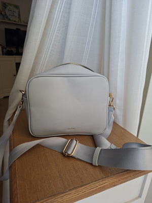 Carpisa bag like new, soft blue with gold details