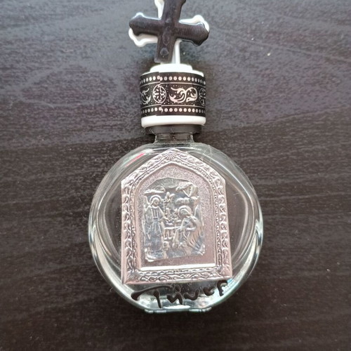 Small holy water bottle used