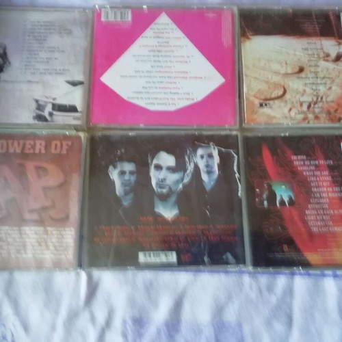CD discs collection with Audioslave, Muse, The Power Of Rap, Korn, Fashion TV, Alexander